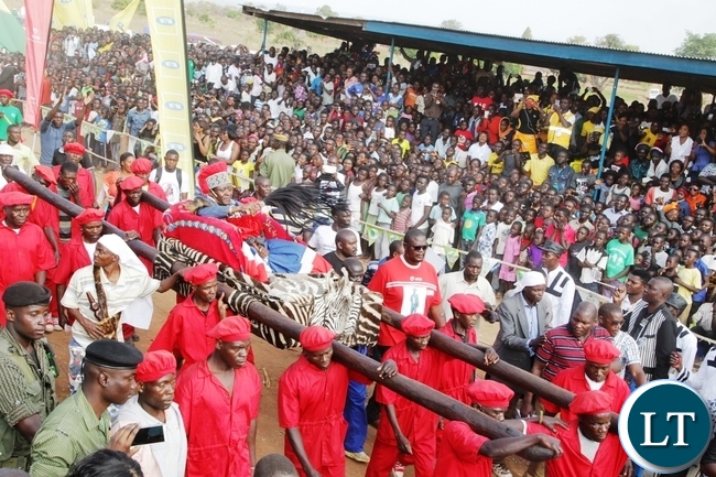 Mwata kazembe paul mpemba kanyembo being taken around the main arena during the umutomboko ceremony in mwansabombwe Mwata kazembe paul mpemba kanyembo being taken around the main arena during the umutomboko ceremony in mwansabombwe
