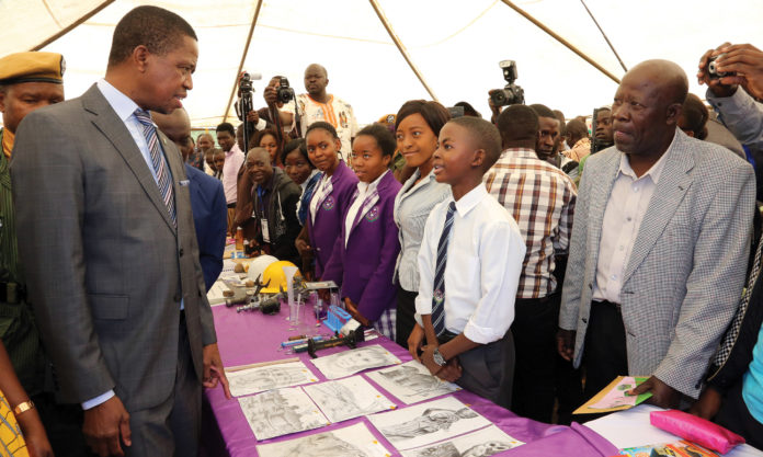 PRESIDENT Lungu talks to 13-year-old Cosmas Mulenga, an art student of Fordina Pandeni Secondary School, at the on-going Luapula Expo in Mansa yesterday. PICTURE: EDDIE MWANALEZA/STATE HOUSE PRESIDENT Lungu talks to 13-year-old Cosmas Mulenga, an art student of Fordina Pandeni Secondary School, at the on-going Luapula Expo in Mansa yesterday. PICTURE: EDDIE MWANALEZA/STATE HOUSE