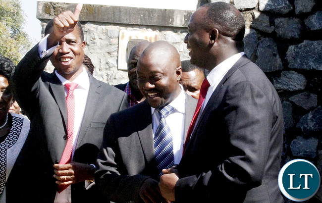 PRESIDENT Lungu with government chief whip Richard Musukwa (right) and Kabwe Central member of Parliament Tutwa Ngulube (centre) after a meeting with parliamentarians at Parliament Building yesterday. PICTURE: COLLINS PHIRI