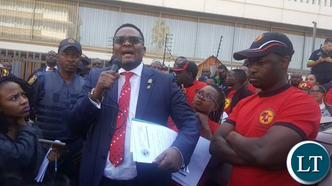 Emmanuel Mwamba speaking when he received a memorandum of demands NUMSA