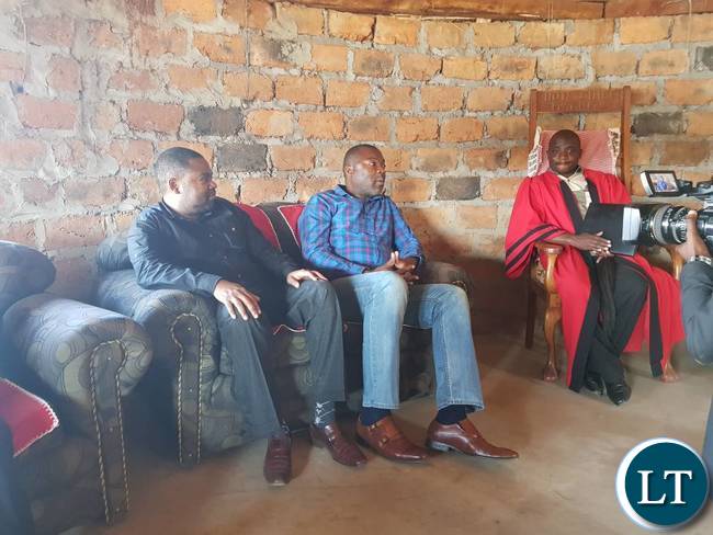 In a meeting with Chief Machiya at his palace, flanked by Mpongwe DC