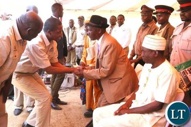 PRESIDENT Edgar Lungu shake hands with Chief Chama of the Chishinga speaking people in Kawambwa District of Luapula province shortly after commissioning the of Kawambwa- Mporokoso road which will be tarred at a cost 142,2 Million United States Dollars. PRESIDENT Edgar Lungu shake hands with Chief Chama of the Chishinga speaking people in Kawambwa District of Luapula province shortly after commissioning the of Kawambwa- Mporokoso road which will be tarred at a cost 142,2 million United States Dollars.