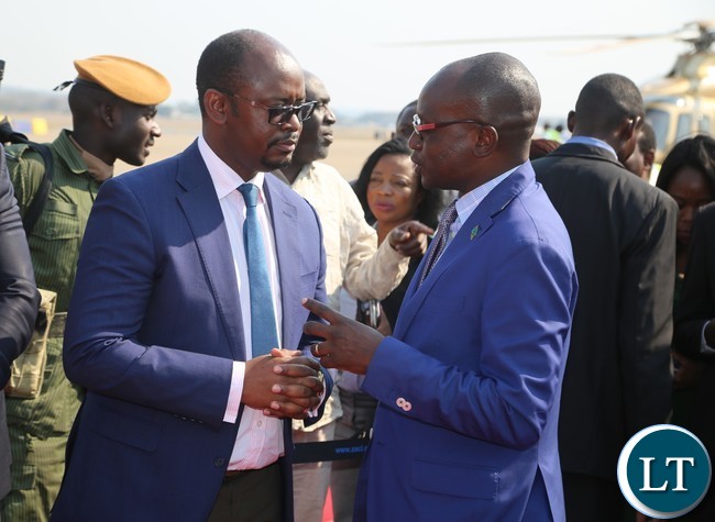 Special Assistant to the President for Press and Public Relations Amos Chanda chats with Patriotic Front Media Director Sunday Chanda at Kenneth Kaunda International Airport yesterday 17-08 2017. Picture by ROYD SIBAJENE/ZANIS Special Assistant to the President for Press and Public Relations Amos Chanda chats with Patriotic Front Media Director Sunday Chanda at Kenneth Kaunda International Airport yesterday 17-08 2017. Picture by ROYD SIBAJENE/ZANIS