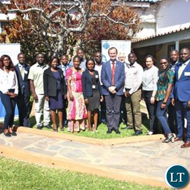 British High Commissioner to Zambia Fergus Cochrane-Dyet poses for a photo with the recipients of the Commonwealth Scholarships British High Commissioner to Zambia Fergus Cochrane-Dyet poses for a photo with the recipients of the Commonwealth Scholarships