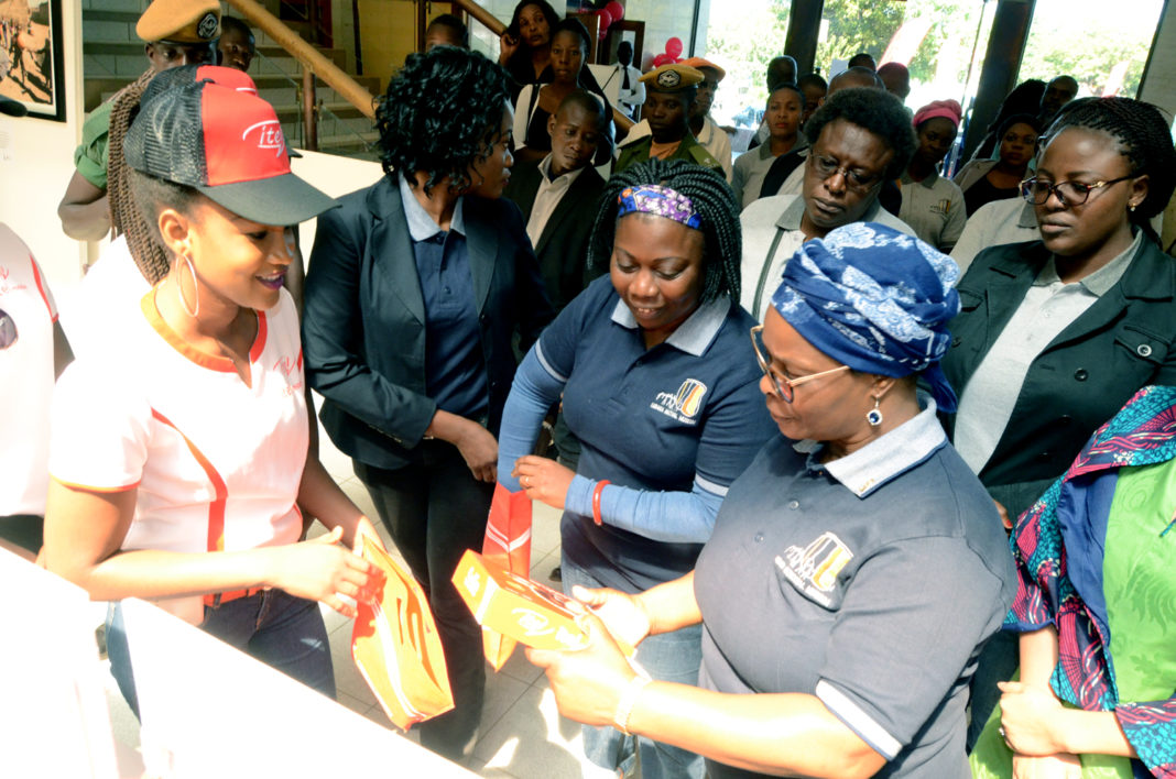 First Lady Esther Lungu presented with Itel S31 mobile phone at launch of National museum day