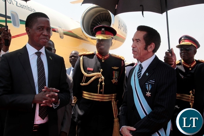 PRESIDENT Edgar Lungu in a conversation with President Seretse Khama Ian Khama shortly before departure for Lusaka at Sereste Khama International Airport
