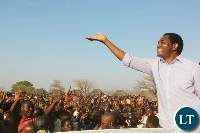HH waving the party symbol to UPND Supporters