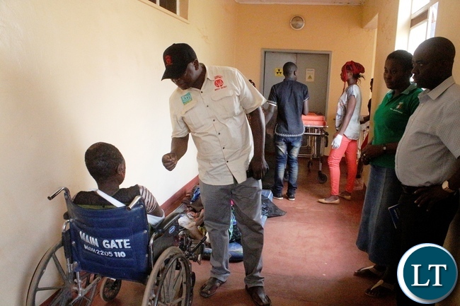 Mbala District Commissioner Kedrick Sikombe visiting a one year old baby accident victim in the ICU at Mbala general hospital in Mbala today. The accident which happened along the Maba-Mpulungu road has claimed 17 lives of the Catholic St Vincent De Paul group from Senga district who were headed for Mpulungu.The Isuzu truck Reg No ACK 5871 was carrying over 60 people carried off the road after losing brakes. Several other people are admintted in Mbala and Mpulungu hospitals with critical conditions.Picture by Mary Bwembya (ZANIS)