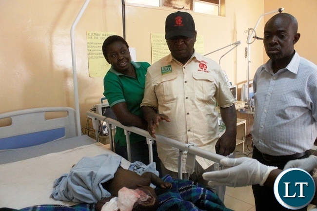 Mbala District Commissioner Kedrick Sikombe visiting a one year old baby accident victim in the ICU at Mbala general hospital in Mbala today. The accident which happened along the Maba-Mpulungu road has claimed 17 lives of the Catholic St Vincent De Paul group from Senga district who were headed for Mpulungu.The Isuzu truck Reg No ACK 5871 was carrying over 60 people carried off the road after losing brakes. Several other people are admintted in Mbala and Mpulungu hospitals with critical conditions.Picture by Mary Bwembya (ZANIS)