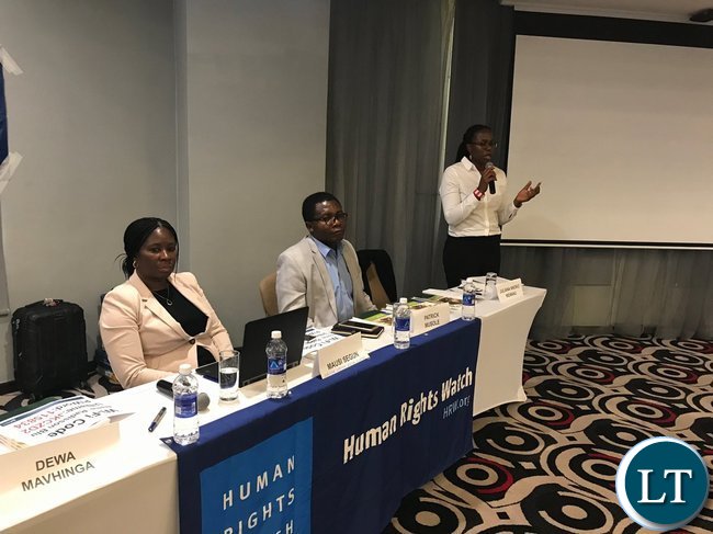 Human Rights Watch officials at the report launch in Lusaka on Wednesday