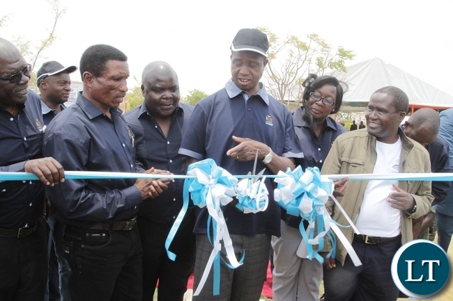 President Edgar Lungu cuts the ribbon to officially launch the Zambia Aquaculture Enterprise Development Project in Lilayi