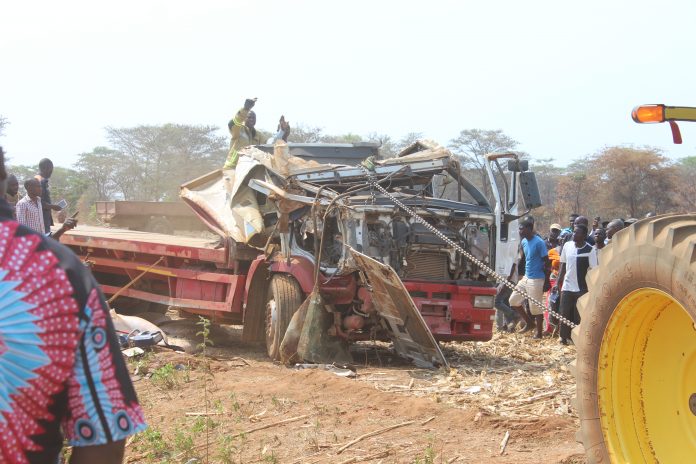 A Zambeef tractor pulls the cabin of a truck in a bid to set free the deceased driver who was trapped in the motor vehicle for over 5 hours following an accident along the Chowa Lukanga Road in Mpongwe this morning. Picture by Noah Kangali. (ZANIS) A Zambeef tractor pulls the cabin of a truck in a bid to set free the deceased driver who was trapped in the motor vehicle for over 5 hours following an accident along the Chowa Lukanga Road in Mpongwe this morning. Picture by Noah Kangali. (ZANIS)