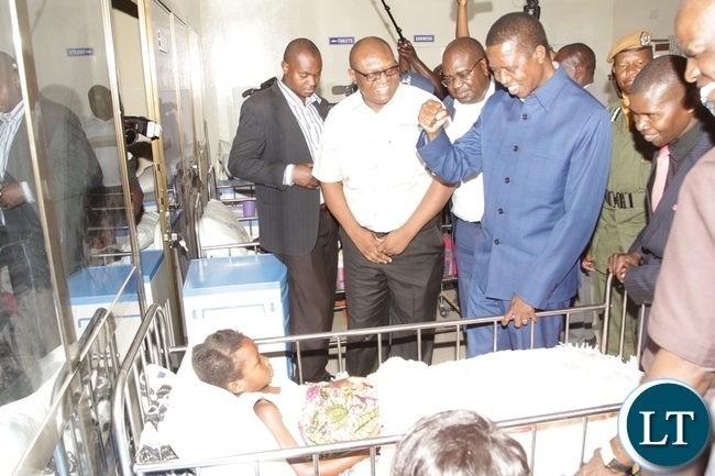 PRESIDENT Edgar Lungu greets a patient at a newly built Nkana Clinic in Lufwanyama.