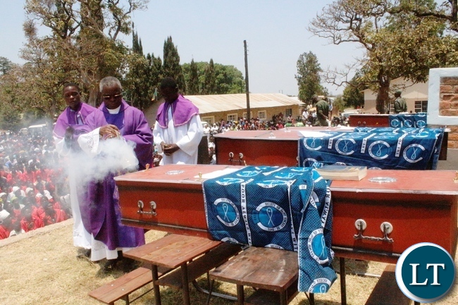 Vicar General Fr. Rodgers Fikwamo during mass for the burial of the 17 accident victims held at Mambwe Mission in Senga district today. The 17 died when the Isuzu truck Reg No ACK 5871 which was carrying over 60 members of the Catholic church along the Mbala-Mpulungu road on saturday morning overturned after losing brakes. Several other people are still admitted to Mbala and Mpulungu hospitals with head inquires.-Picture by Mary Bwembya (ZANIS)