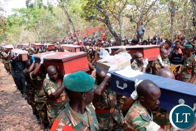 Pall-Bearers during a ceremonial burial for the 17 accident victims held at Mambwe Mission in Senga district today. The Isuzu truck Reg No ACK 5871 which was carrying over 60 Members of the Catholic church overturned after losing brakes. Several other people are still admitted to Mbala and Mpulungu hospitals with head inquires.-Picture by Mary Bwembya (ZANIS)