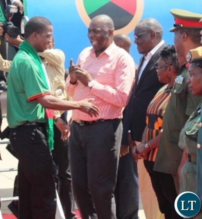 President Edgar Lungu chats with Copperbelt Province Minister, Bowman Lusambo (middle) and acting Minister of Sports, Charles Banda (right) upon his arrival at Simon Mwansa Kapwepwe Airport in Ndola. Picture by TISA BANDA NKHOMA/ZANIS.