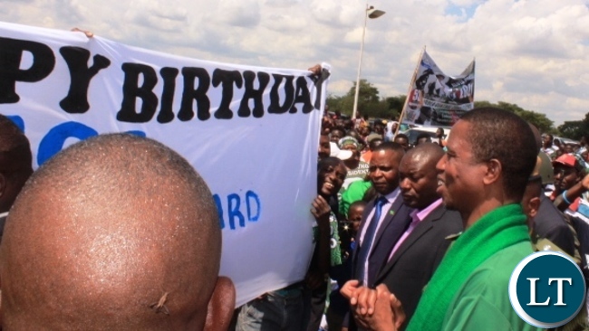 President Edgar Lungu admires a banner displayed by some PF members to wish him a happy birthday when he arrived at Simon Mwansa Kapwepwe Airport in Ndola on Saturday. Picture by TISA BANDA NKHOMA/ZANIS