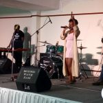 Chembo on stage performing 2