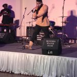 King Illest performing on stage