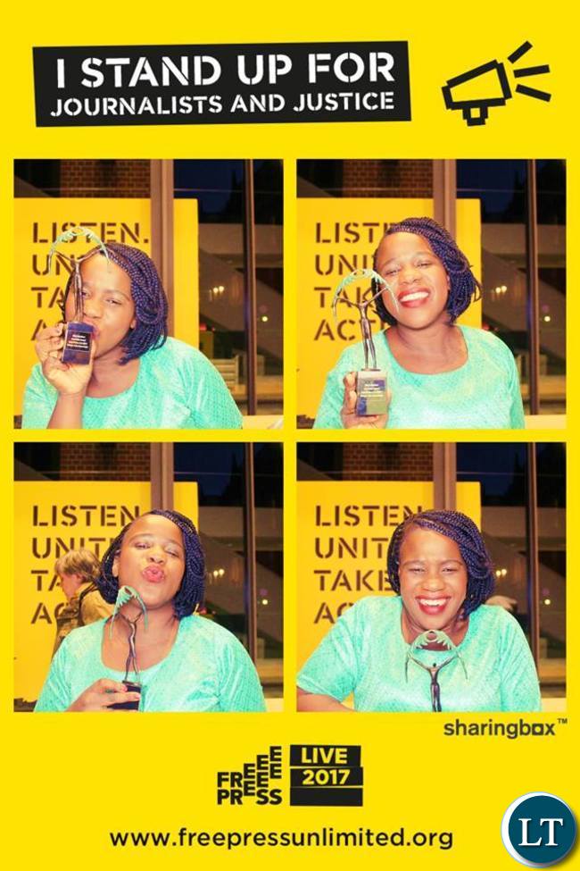 Mwape Kumwenda poses with her award