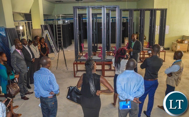 Zamtel Senior Technical Manager Clifton Masua shows some of the newly installed power solutions at the Zamtel Woodlands Technical Centre