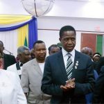 President Edgar Chagwa Lungu (cente) displays the badge he received from Lion 413 District Governor Jessica Chobe (left) on the right is Lions International Director Lion Hastings Eli Chiti during the Lion District 413 Zambia Fundraising for Melvin Jones Children Eye Referal Hospital at Pamodzi Hotel in Lusaka on Saturday,November 25,2017. SALIM HENRY/STATE HOUSE ©2017