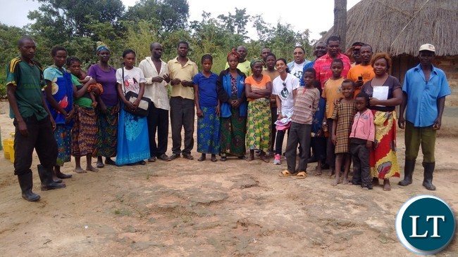 Humanity Africa Chief Executive Officer Bhupinder Singh Baidwan with some farmers in Mkushi.