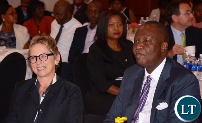 World Bank Country Manager Ina Ruthenberg and Minister of Finance Felix Mutati follow the proceedings during the World Bank Launch of the tenth of Zambia Economic Brief at Pamondzi Hotel