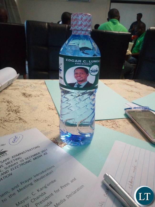 Edgar Lungu branded water bottle during the workshop