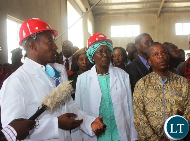 Vice President Inonge Wina (centre) with Central Province Minister Sydney Mushanga inspecting the fertiliser plant shortly after the official opening in Kabwe. Picture by SUNDAY BWALYA / ZANIS