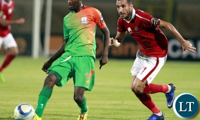 Zesco United’s John Ching’andu in action against Al Ahly’s Ali Maaloul during the CAF group stage match between Al Ahly and Zesco United at the military Stadium in Suez, Egypt, 12 August 2016. EPA-KHALED ELFIQI Zesco United’s John Ching’andu in action against Al Ahly’s Ali Maaloul during the CAF group stage match between Al Ahly and Zesco United at the military Stadium in Suez, Egypt, 12 August 2016. EPA-KHALED ELFIQI