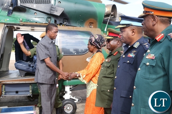 Vice President Inonge Wina receives President Edgar Lungu at ZAF Lusaka shortly before his departure to Muchinga Province for three days working visit whilst Service Chiefs looks on