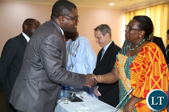Minister of Foreign Affairs Joe Malanji greets High Commissioner of Ghona to Zambia Margaret Ekur Prah during the Diplomatic Corps and High Commissioners accredited to Zambia meet with the newly appointed Minister of Foreign Affairs at Mulungushi International Conference Centre