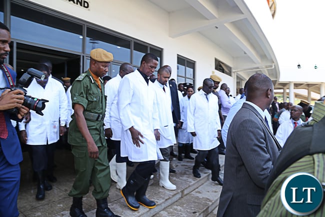President Edgar Lungu and with his entourage leave Heroes Stadium Cholera centre shortly after touring