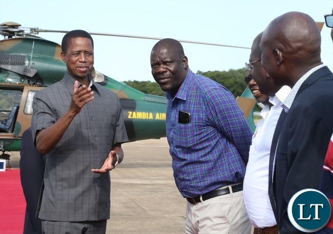 President Edgar Lungu confers with PF Secretary General Davies Mwila at ZAF Lusaka shortly before his departure to Muchinga Province for three days working visit