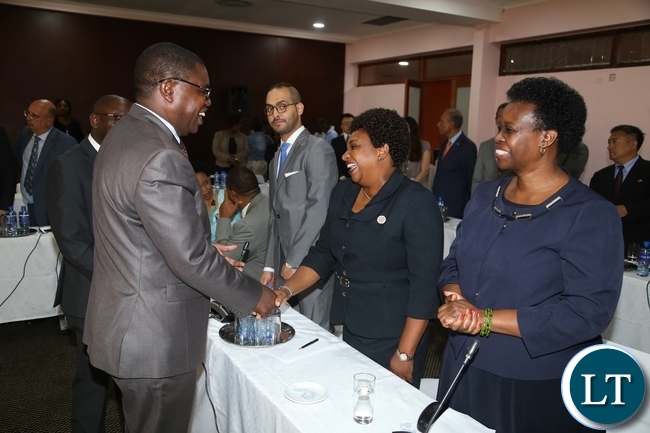 Minister of Foreign Affairs Joe Malanji having a light moment High Commissioner of Kenya to Zambia Sophy Kombe during the Diplomatic Corps and High Commissioners accredited to Zambia meet with the newly appointed Minister of Foreign Affairs at Mulungushi International Conference Centre