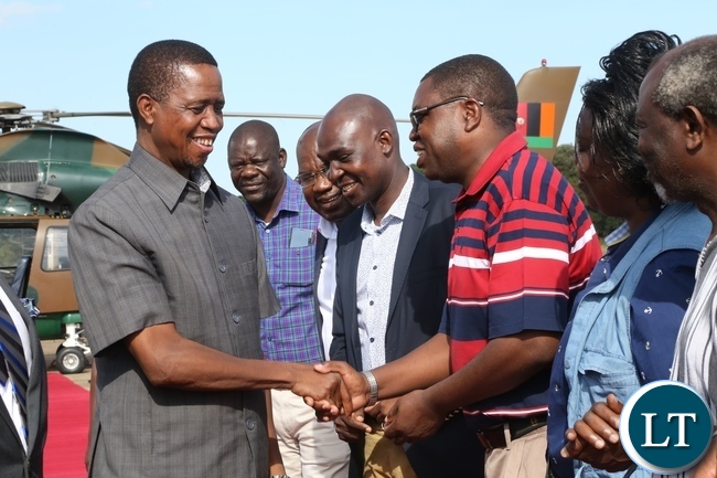President Edgar Lungu shake hands confers with Minister of Foriegn Affairs Joe Malanji at ZAF Lusaka shortly before his departure to Muchinga Province for three days working visit