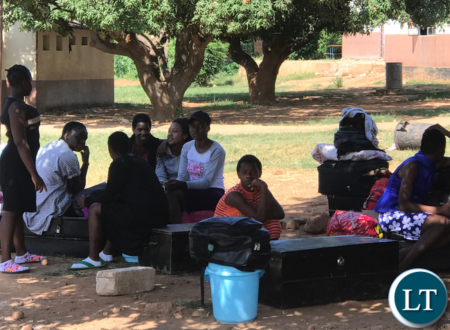 Chongwe's Mukamambo Girls Boarding School pupils waiting for transport back home after the school was abruptly shut