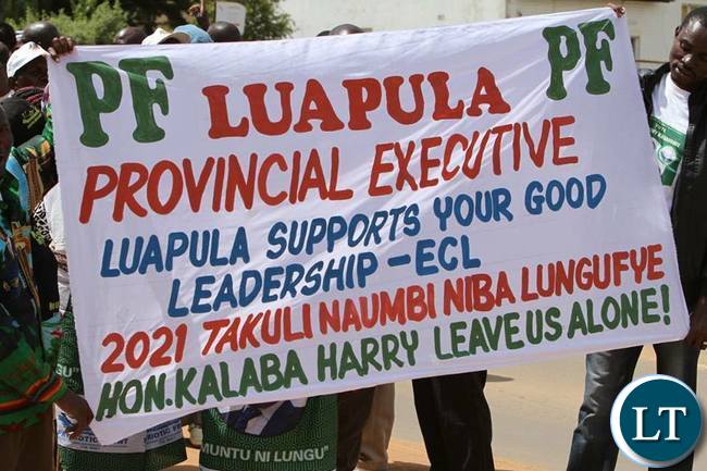 PF Luapula cadres holding placards