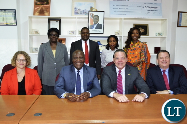 United States Ambassador To Zambia Daniel Foote with staff at Ministry of Finance