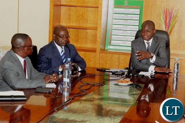 Special Assistant for Press and Public Relations to the President Mr Amos Chanda(right) stresses a point during a press briefing held at Ministry of Information and Broadcasting services board room .Looking on is The Ministry's Permanent Secretary Mr Godfrey Malama (centre) and Zambia News and Information Services Director Mr Patrick Lungu (left) Special Assistant for Press and Public Relations to the President Mr Amos Chanda(right) stresses a point during a press briefing held at Ministry of Information and Broadcasting services board room .Looking on is The Ministry's Permanent Secretary Mr Godfrey Malama (centre) and Zambia News and Information Services Director Mr Patrick Lungu (left)