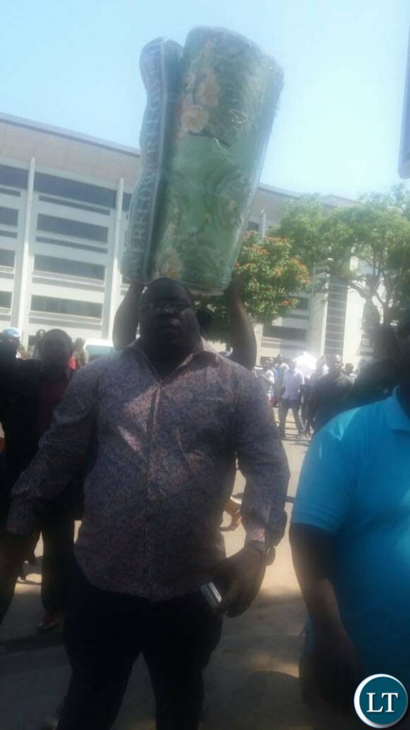 NDC Supporters escoting Kambwili to the Police station