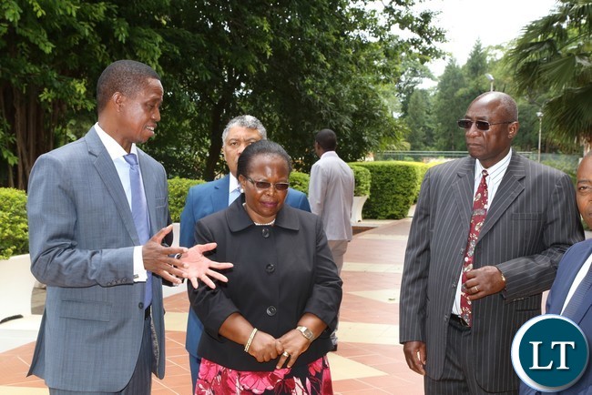 President Edgar Lungu talks to Chief Justice Ireen Mambilima during the swearing in ceremony of court of appeal Judges at State House