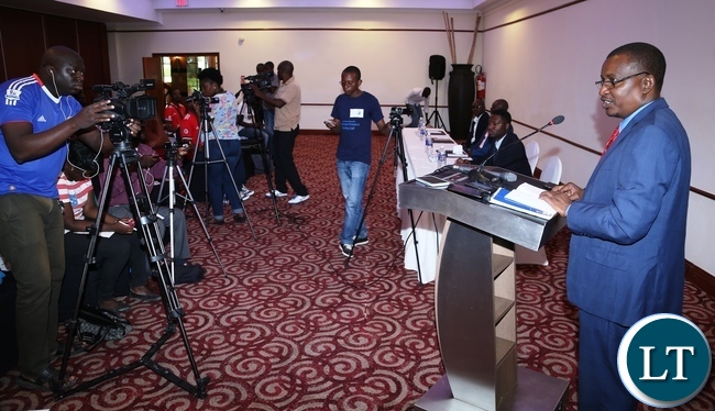 New Revolution Party President Humphrey Siulapwa speaking to journalists during press briefing at Pamondzi Hotel