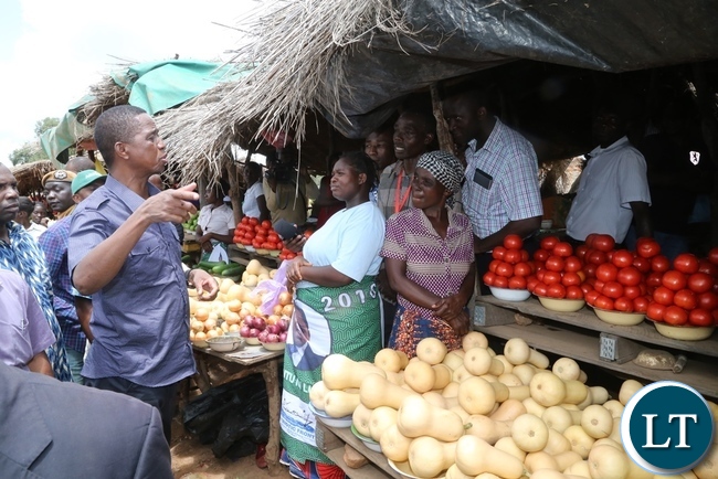 President Edgar Lungu intarects with marketers at John Chinena during the tour of Chibombo District in Central Province