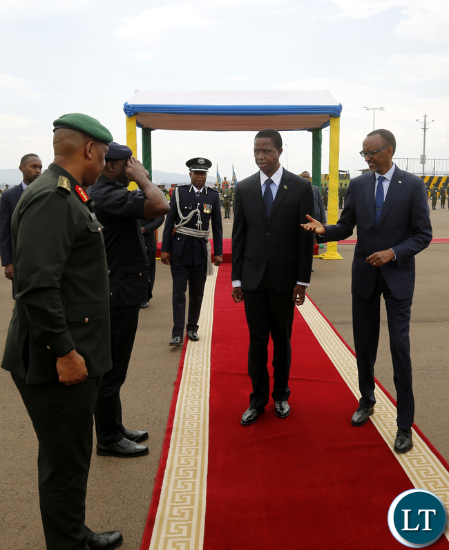 President Edgar Chagwa Lungu accompanied by his Rwandan counterpart Paula Kagame bids farewell to Rwandan Service Chiefs at Kigali International Airport on Thursday,February 22,2018. PICTURE BY SALIM HENRY/STATE HOUSE ©2018