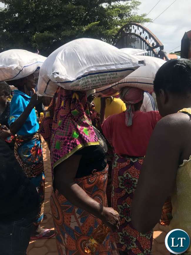 Happy women after receiving their donations
