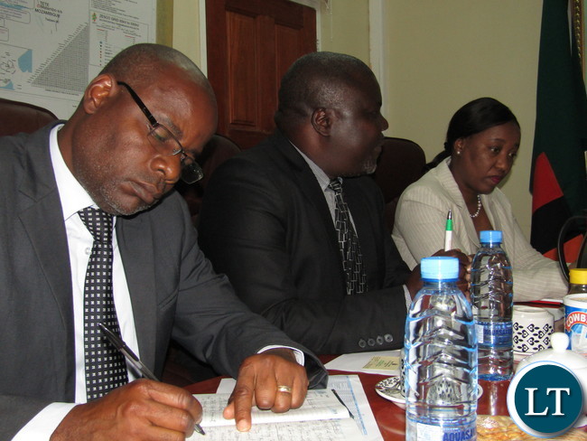 Africa Development Bank (ADB) Country Manager Mary Manneko Monyau with Minister of National Development Planning Alexander Chiteme