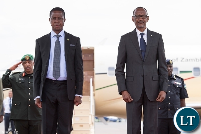 Presidents Paul Kagame and Edgar Lungu shortly after the Zambian leader's arrival at Kigali International Airport yesterday. President Lungu is in Rwanda for a two-day state visit. (Village Urugwiro)