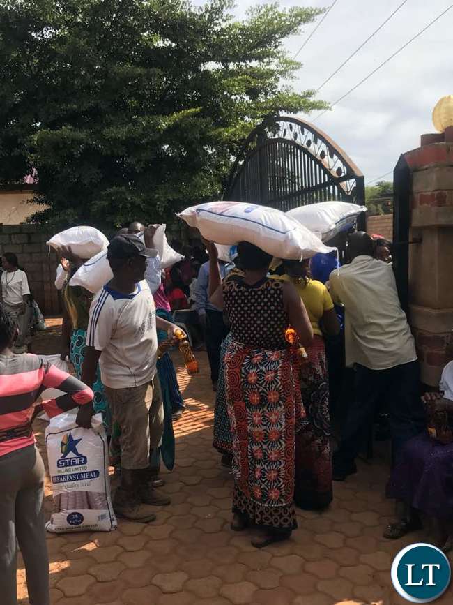 Some of the recipients leaving Mr Lusambo's house